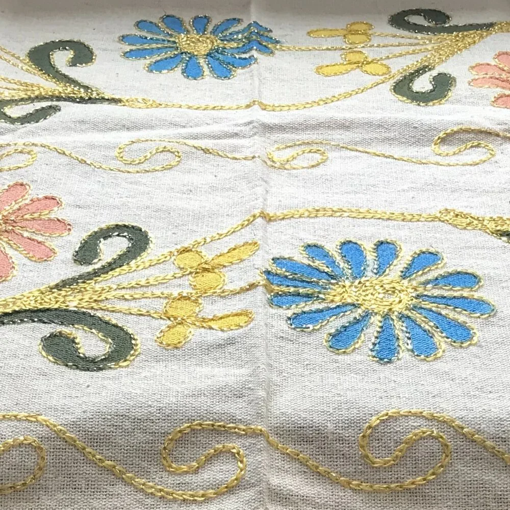 Decorative Turkish table runner with vibrant floral design.